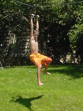Jonathan Day rides the ZIP line